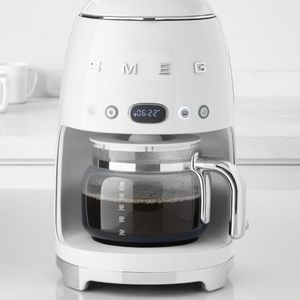 Brand new SMEG coffee maker in white.